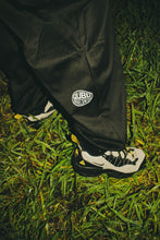 Load image into Gallery viewer, QUBO Worldwide Messenger Trackpants
