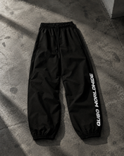 Load image into Gallery viewer, Black Sweatpants Lable - QUBO Worldwide
